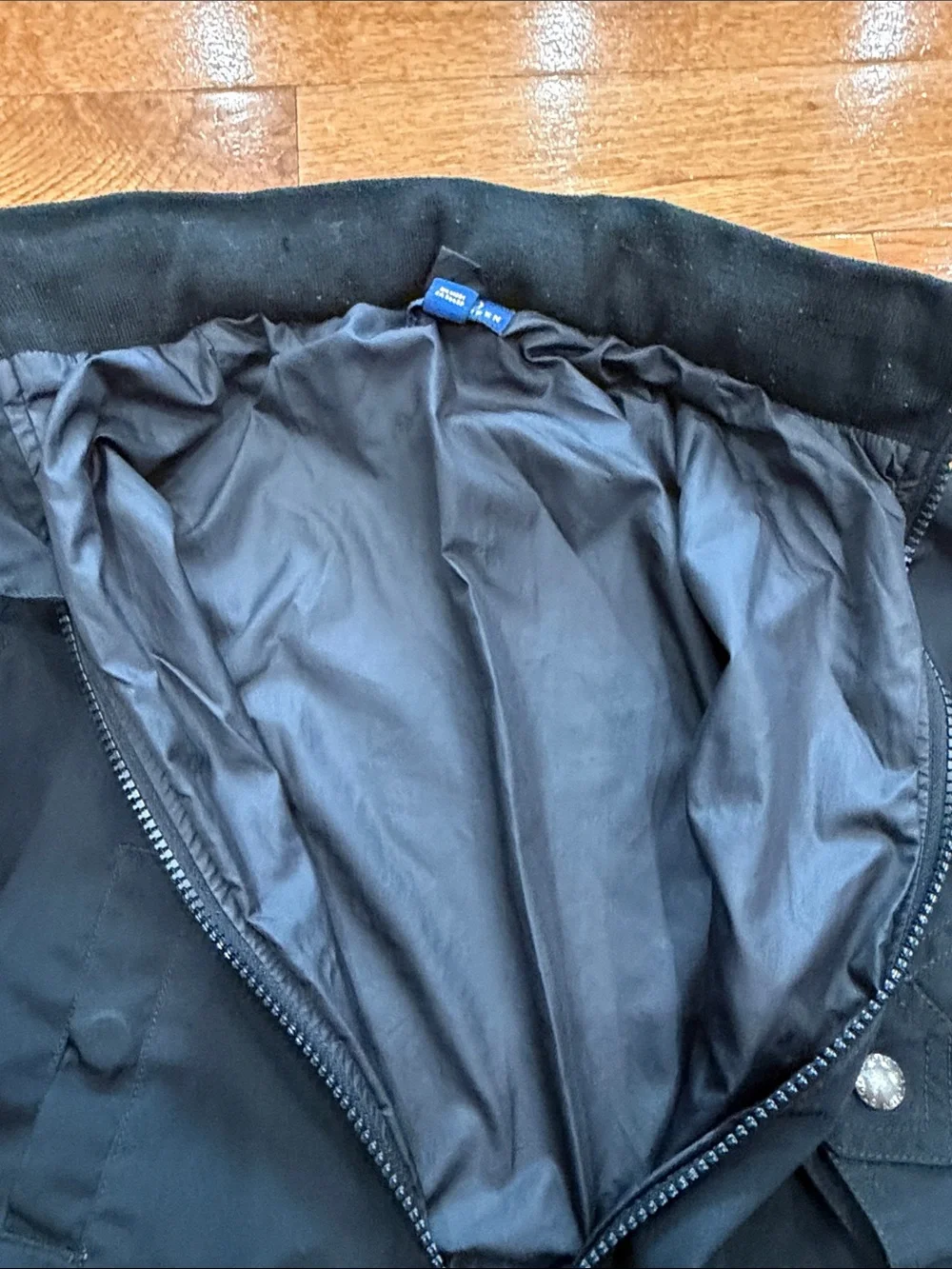 Ralph Lauren Black Jacket with Red Polo Logo, optional hoodie.